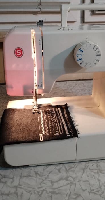 petlə maşını: Singer tikiş maşını duz zigzag və sair tikis funksiyasi var duymə yeri — 2