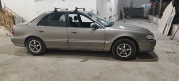 toyota corolla 2006 1.4 diesel: Hyundai Sonata sedan geniş salon. Dam üstü relslər/qalın baqaj relsi — 5