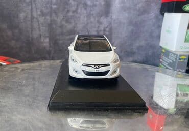maşın modeli: Коллекционная модель Hyundai i30 5 door white 2012 Pino B&D Scale — 13