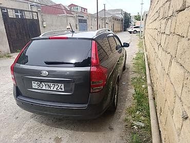 pulsuz ehtiyacı olan: Kia Cee’d SW (universal) – tünd boz rəng, 5 qapılı, dam relsləri ilə — 3