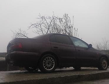 avto rullar: Toyota Carina E: 2 l | 1994 il Sedan — 6