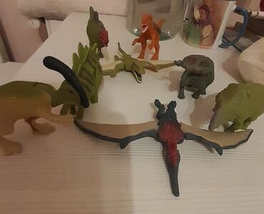 Uşaq arabaları: Mc Donald's happy meal oyuncaqları, dinozavr seriyası satılır. Biri — 1