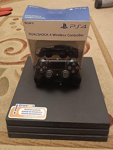 playstation 4: Sony PlayStation 4 Pro oyun konsolu və DualShock 4 simsiz idarəetmə — 1