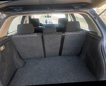 vito disk: Toyota Corolla hatchback (E12), tünd mavi rəng. - Kuzov: 5 qapılı — 10