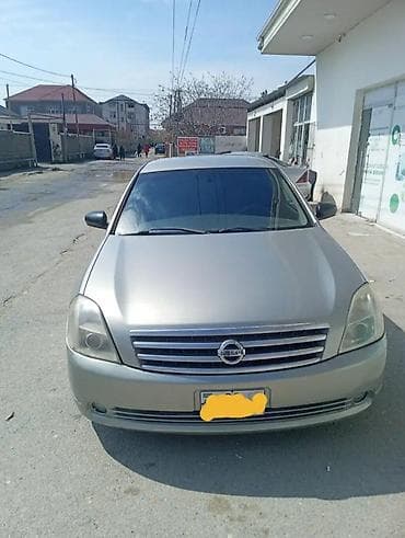 265 75 16: Nissan Teana: 2.3 l | 2003 il Sedan — 1
