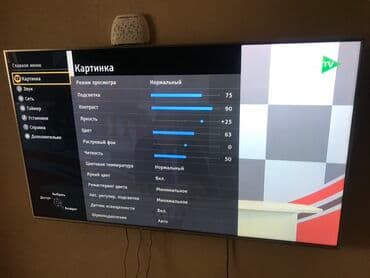 plazma smart tv: Panasonic Smart TV – iri diaqonallı, nazik çərçivəli divara montaj — 6