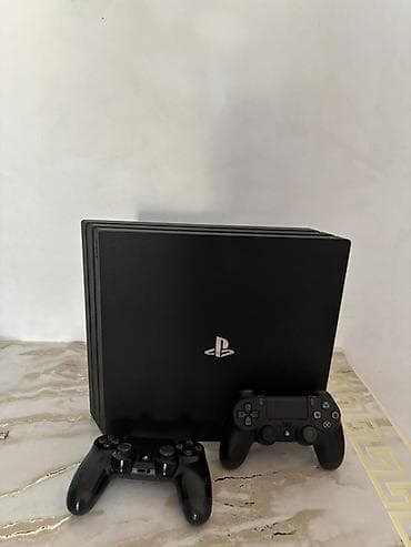 ps4 vr: PlayStation 4 Pro oyun konsolu + 2 ədəd DualShock 4 pultu — 1