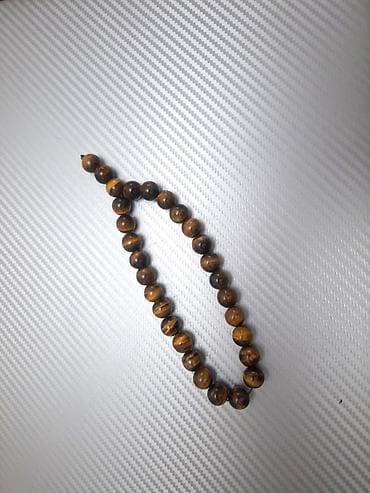 qızıl tesbeh: Təbii “Pələng Gözü” daşlarından təsbeh (tiqriniy qlaz / tiqroviy qlaz — 2