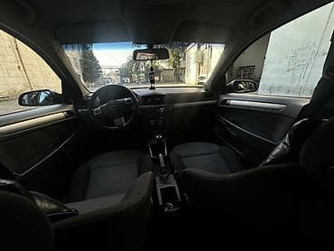 opel astra k: Opel Astra H Caravan (universal), gümüşü rəng. - Kuzov: 5 qapılı — 7