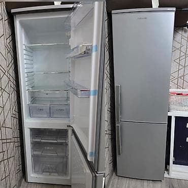 DilekShivaki Soyuducu satilir 450 azn satilir. Tecili satilir