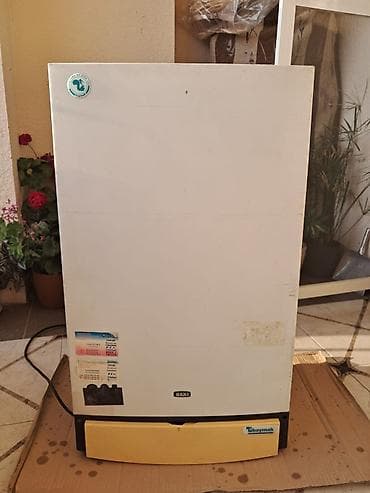 Baxi/Baymak qazla işləyən kombi qazanı - Marka: BAXI (ön paneldə)