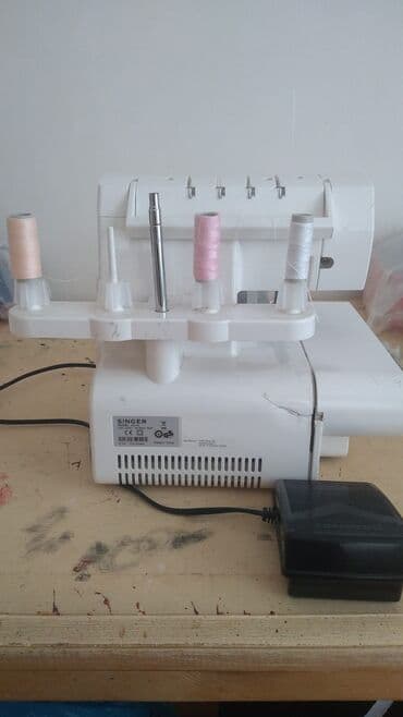 купить измельчитель сена бу: Overlok maşini az islenmis. arxa rezininde bir az cat var ancaq — 3