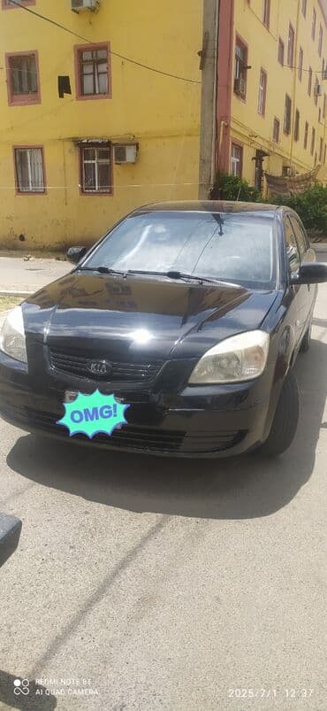 последующий выкуп авто бишкеке: Qara rəngdə olan Kia Rio avtomobili. Bu model şəhər daxilində rahat — 3