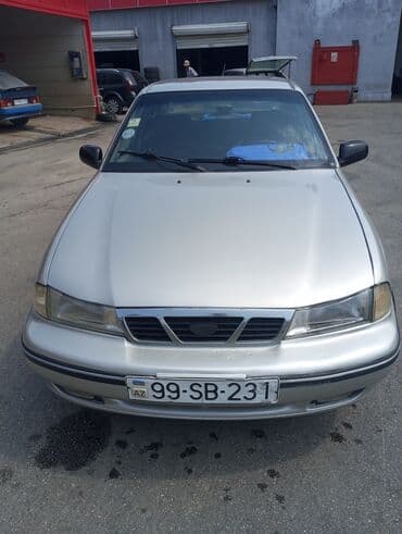 купить чехлы на авто: Model: Daewoo Nexia sedan Kuzov: 4 qapılı, gümüşü rəng — 4