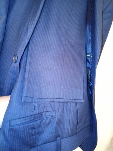 göy rəngli kişi cemperləri: Türkiyə istehsalı Kişi kastyum şalvarı. Razmer : 50.Rəng Tünd göy — 7