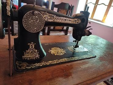 saat ev: Məhsul: Singer ayaqla işləyən tikiş maşını (mexaniki treadle — 1