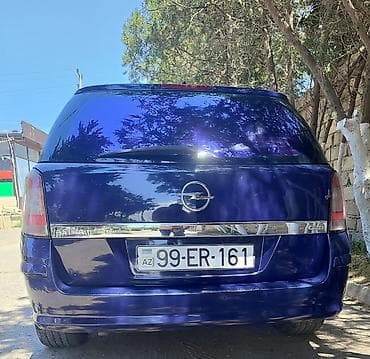 13 disk: Opel Astra Caravan (Universal) – mavi rəng - Kuzov: universal — 2