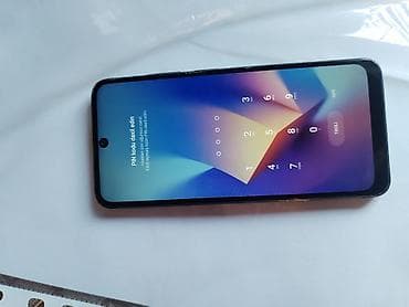 techno spark slim: Smartfon – tam ekranlı, ön kameraya görə ekranın yuxarı mərkəzində — 2