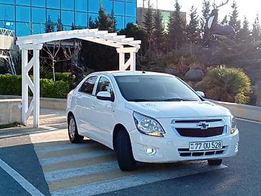 sen balaca chevrolet: Chevrolet Cobalt, ağ rəng, sedan kuzov. Buraxılış 2031 ə kimi var — 4