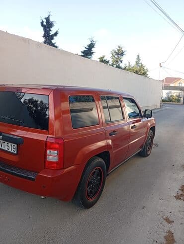 mercedes paxlava goz: Jeep Patriot, narıncı rəngli, 5 qapılı SUV. Xüsusiyyətlər: - — 2