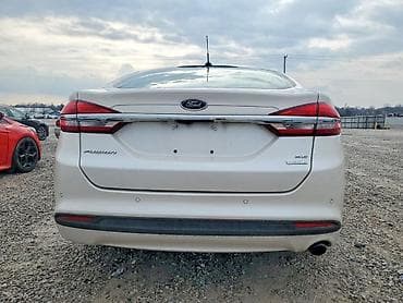 şevralit avtomobil: Ford Fusion sedan Xüsusiyyətlər: - Kuzov: 4 qapılı sedan, ağ rəng - — 7