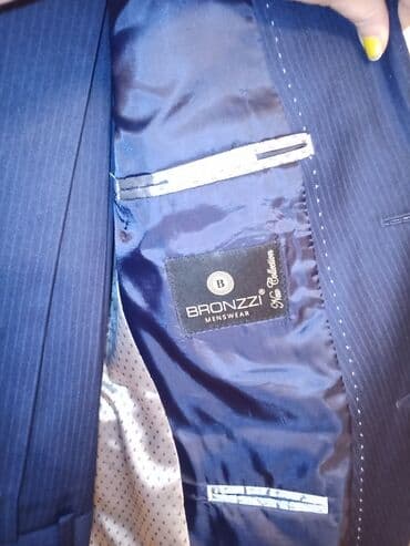 göy rəngli kişi cemperləri: Türkiyə istehsalı Kişi kastyum şalvarı. Razmer : 50.Rəng Tünd göy — 3