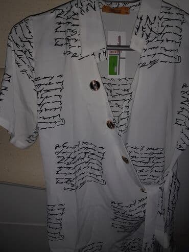 ağ koftalar: Kofta xanımlar üçün olan bu gözəl qısaqol kofta satılır. 38 razmerdir — 4