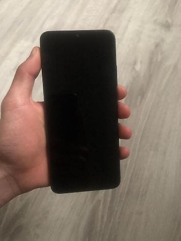 Xiaomi Redmi smartfon - Model: Redmi (mavi rəng, arxa paneldə Redmi