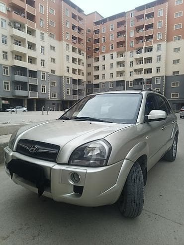 guzgusu: Hyundai Tucson (1-ci nəsil) krossover/SUV - Korpus rəngi: açıq gümüş — 1