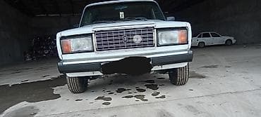 lada 3110: LADA Riva (VAZ 2107) sedan – ağ rəngli, Azərbaycan qeydiyyat nömrəli — 3