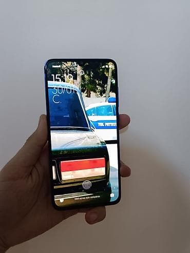 Xiaomi Mi 9 Lite, rəng - Mavi, 
 Barmaq izi