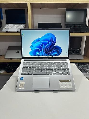 ASUS: • Model Asus VivoBook Go 15 • Prosessor i3-13gen • Ram 8GB 3200MHz — 1