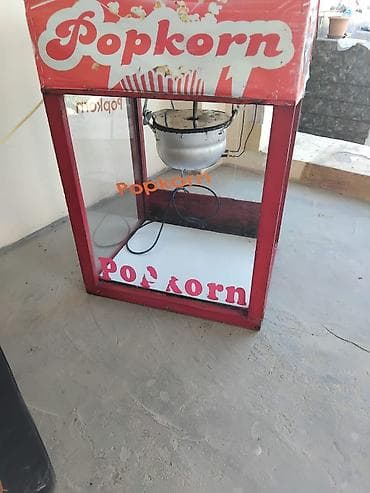 Popkorn aparatı – şüşəli vitrinli, elektriklə işləyən model. Üst lalafo.az -da Popkorn aparatı – şüşəli vitrinli, elektriklə işləyən model. Üst