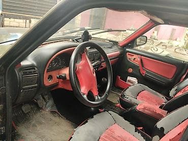 opel tigra 2005: GAZ Volga 3110, qara rəng, sedan kuzov. Xüsusiyyətlər: - Klassik xrom — 10