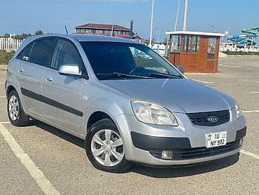 ağ maşın: Kia Rio: 1.4 l | 2007 il Hetçbek — 2