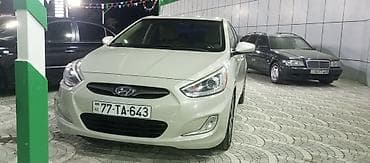Hyundai Accent: 1.6 l | 2015 il Sedan — 4