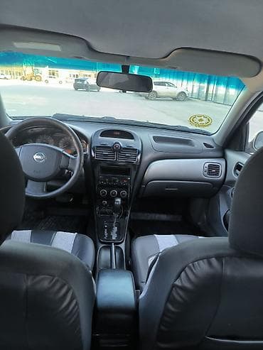 diffuser satisi: Nissan Sunny: 1.6 l | 2011 il Sedan — 5