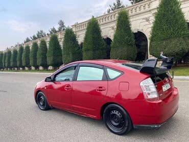 diskler r17: Toyota Prius (ikinci nəsil) – hibrid hetçbek - Rəng: qırmızı - Kuzov — 10