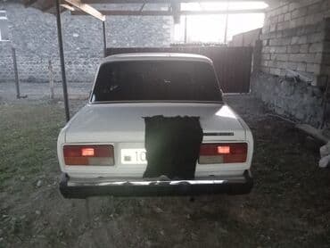 ceşka disk: VAZ 2107 sedan - Kuzov: ağ rəng, 4 qapı, klassik “07” dizaynı, xrom — 2
