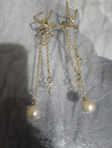 qaqa dəsti: Zərgərlik dəsti – klassik və zərif üslub - Komplekt tərkibi: - Uzun — 7