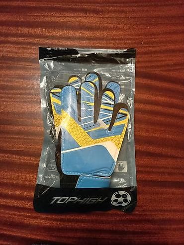 İdman çantaları: Rus dili: Вратарские перчатки для ребёнка до 12 лет. Синие а сзади — 1