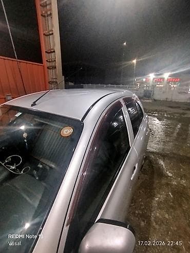 1993 bmw 318i: Nissan March: 1.2 l | 2012 il Hetçbek — 4