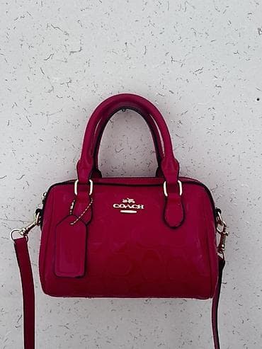 Çiyin çantası, Məşqçi