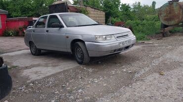 masin elani: Gümüşü rəngdə olan Lada 110 model avtomobil. Salonu səliqəli — 1