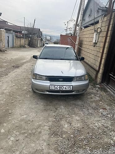 Daewoo: Daewoo Nexia sedan - Kuzov: 4 qapılı sedan, gümüşü rəng - Mühərrik və — 5