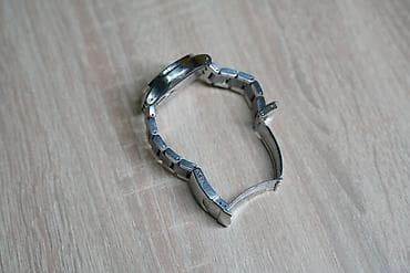 qol: İşlənmiş, Qol saatı, Swatch, rəng - Gümüşü — 2