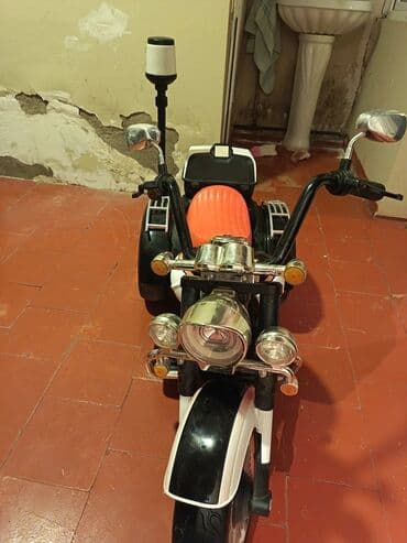 Uşaq elektrik motosikleti – 3 təkərli Xüsusiyyətlər: - Elektriklə