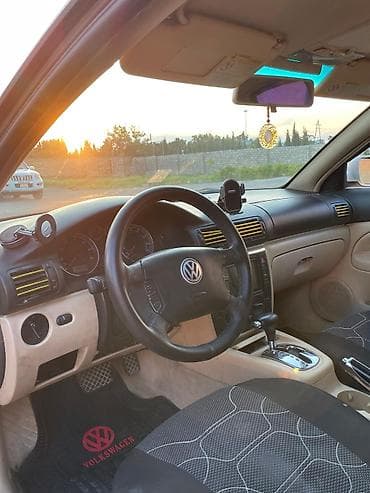 multi sukan: Volkswagen sedan – salon detalları və komfort - Rəng: bej/qaranlıq — 7
