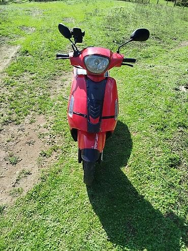 tubo az: Qırmızı rəngli şəhər skuter/moped Xüsusiyyətlər: - Kompakt və yığcam — 3