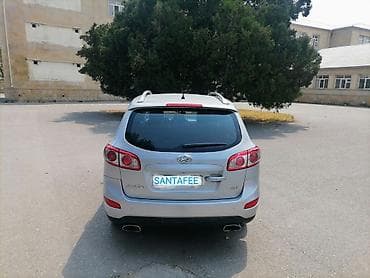 ford focus hatchback: Hyundai Santa Fe: 2 l | 2010 il Krossover — 2